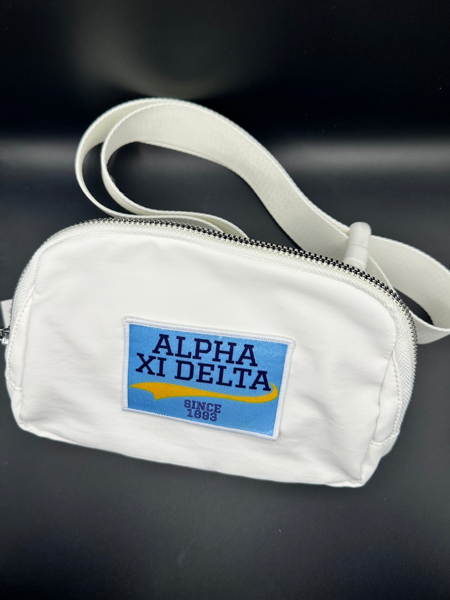 Alpha Xi white belt bag with patch